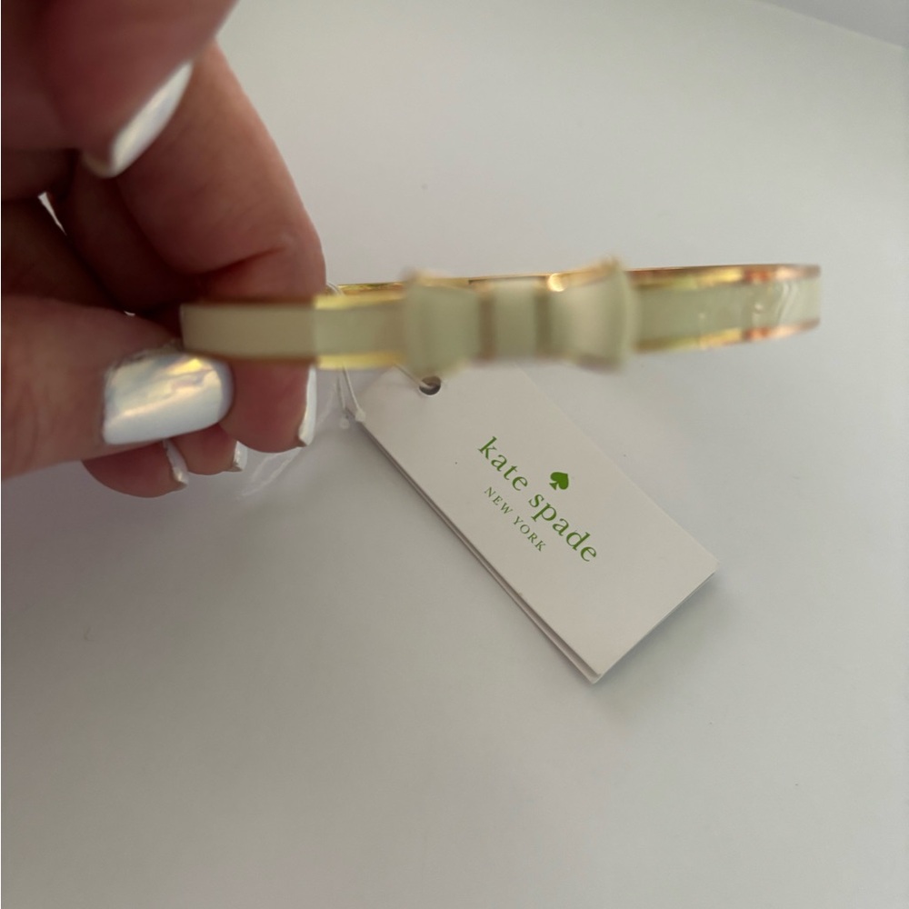 Kate Spade Gold and Cream Bow Bangle